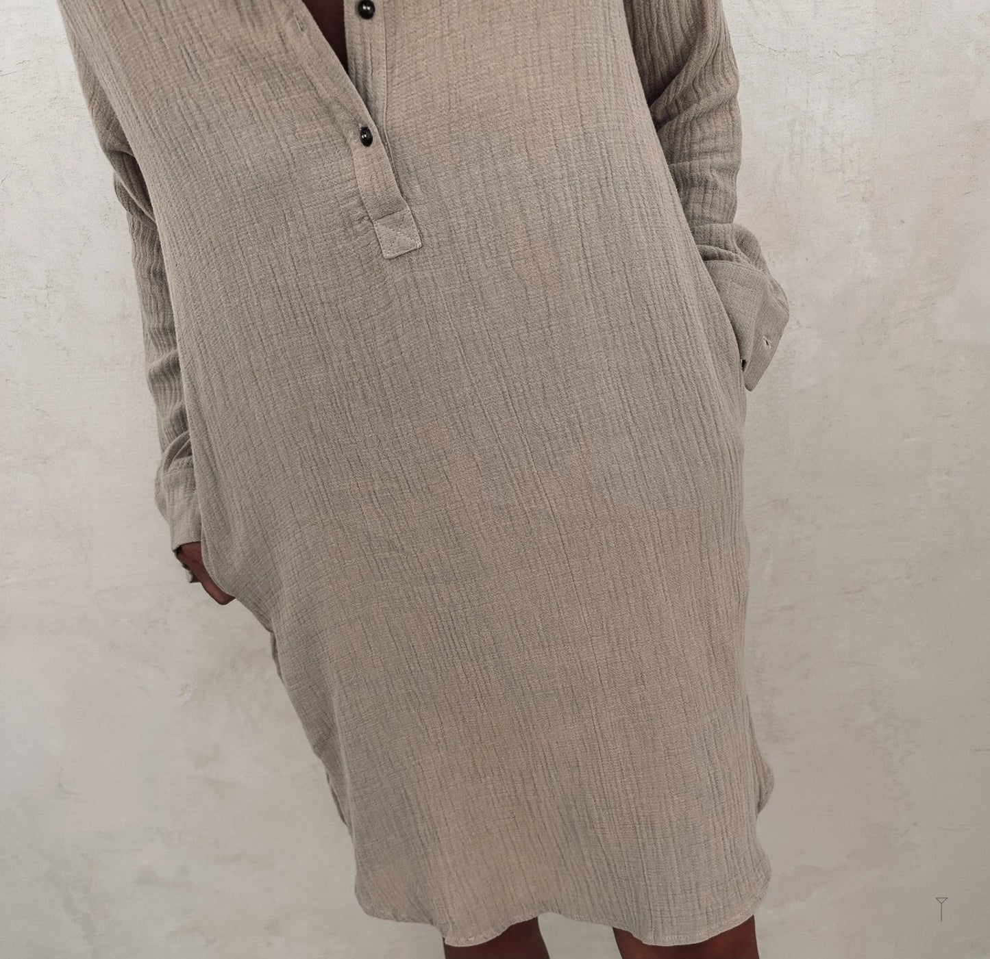 Button front shirt dress with a long sleeves.