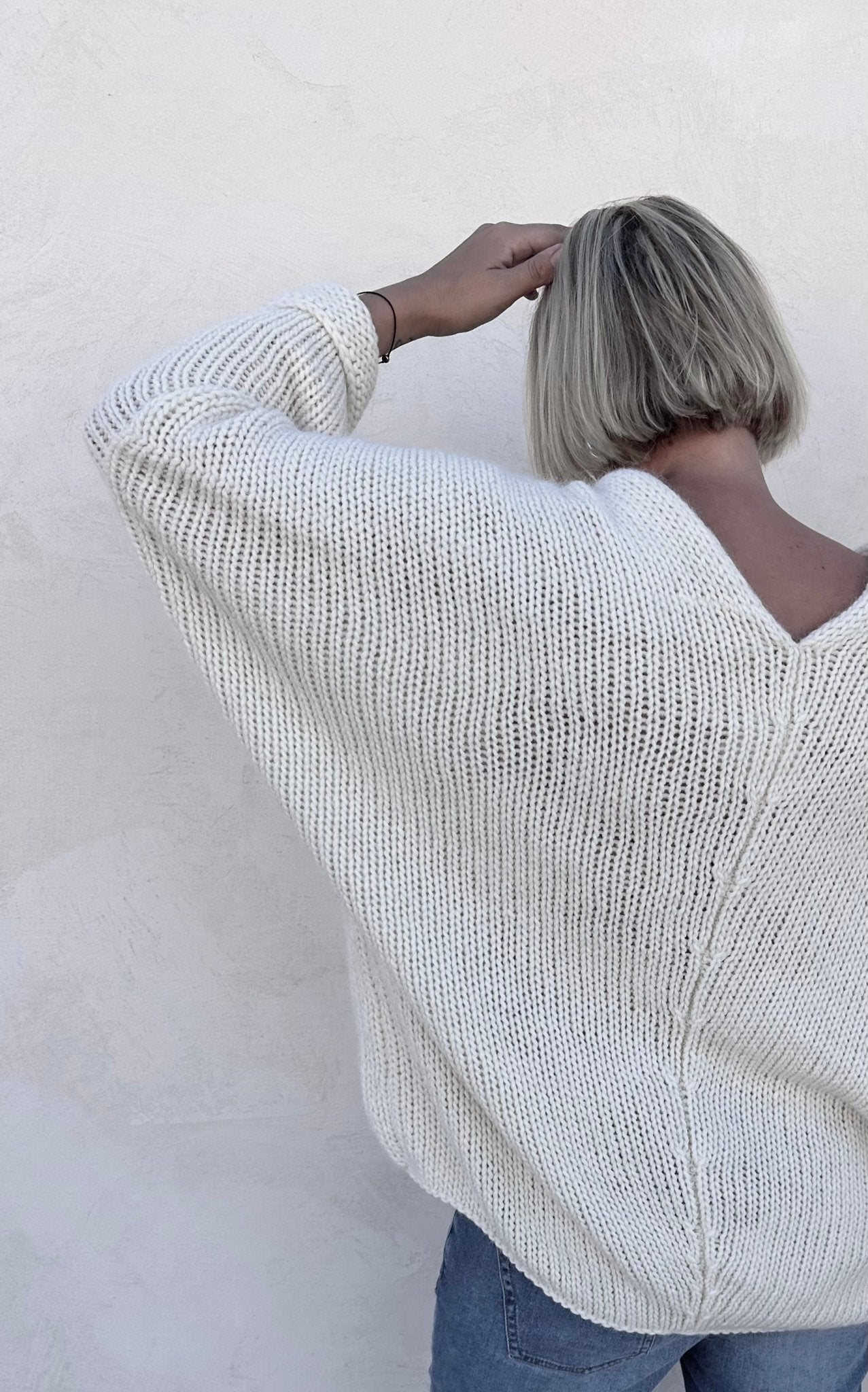 White oversized sweater back shoot