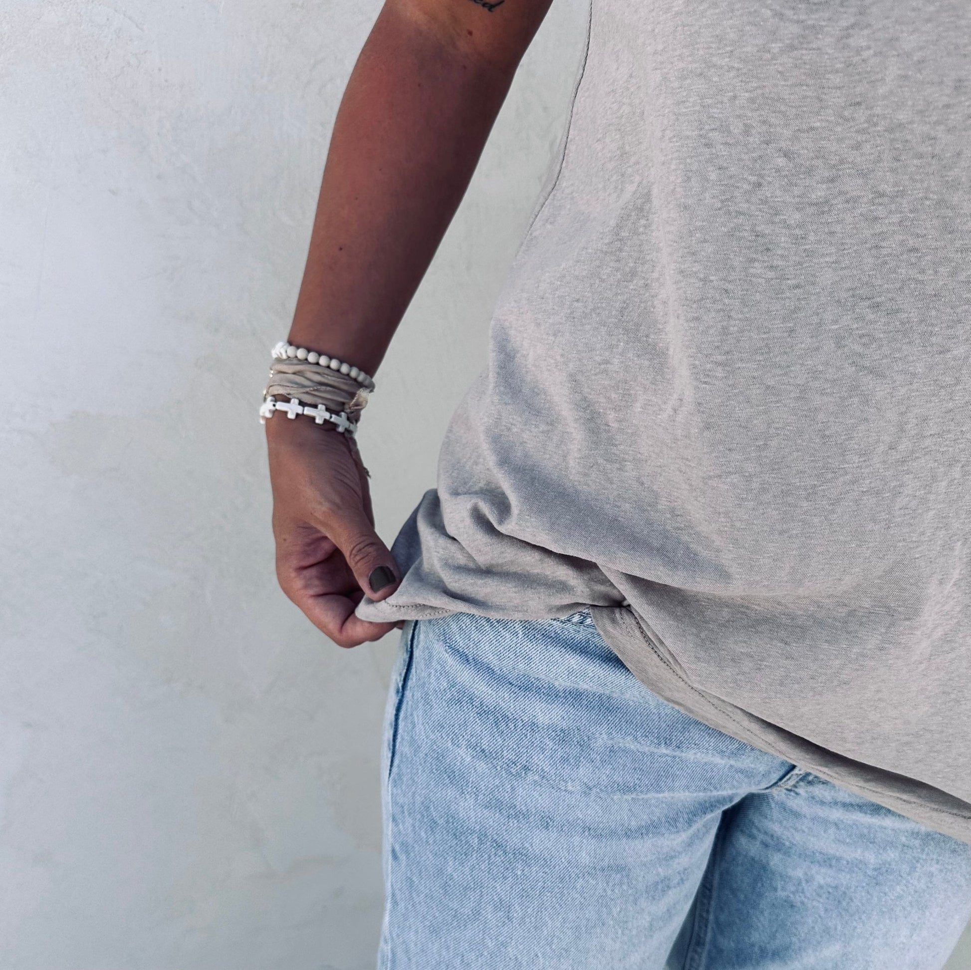 A person with a tulua tank top. 