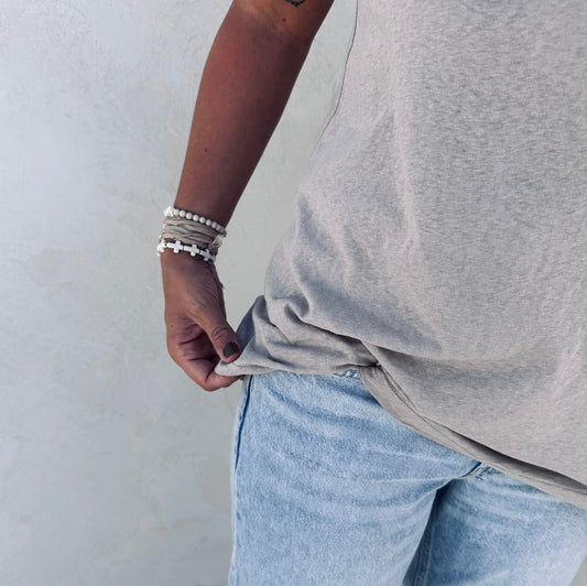 A person with a tulua tank top. 